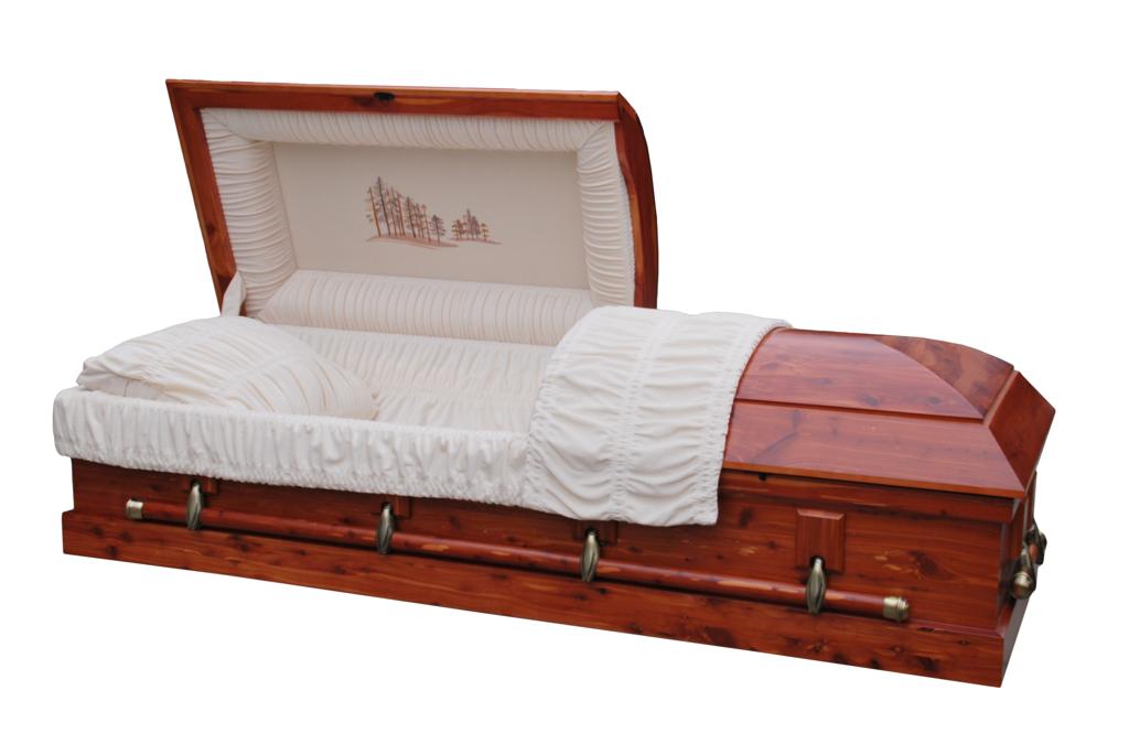 Split-lid American-style casket constructed of MDF and cedar veneer, with swing-bar handles and an almond velvet interior including head-panel with forest motif. Finish is satin, with a natural cedar color. 