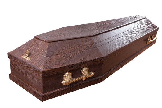 Brunswick solid walnut coffin – closed single-lid coffin with bronze-coloured fixed handles, a lid-mounted bronze-coloured escutcheon, and a matte natural wood-grain finish.