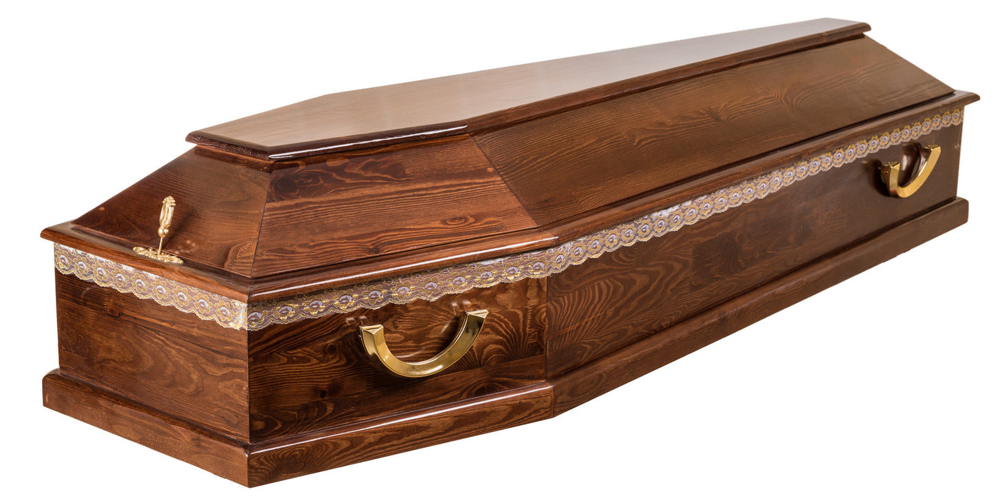 Willis walnut-veneer coffin – Closed single-lid coffin with gold-coloured swing handles, lace embroidery, and a lid-mounted adornment, in a semi-gloss walnut-grain finish. 