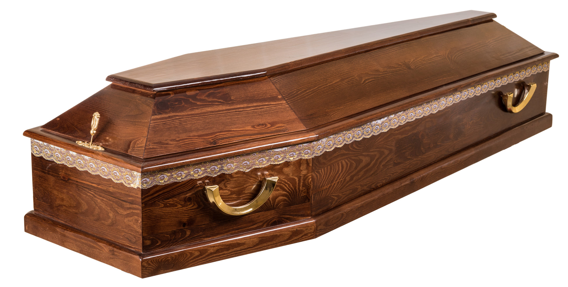 Willis walnut-veneer coffin – Closed single-lid coffin with gold-coloured swing handles, lace embroidery, and a lid-mounted adornment, in a semi-gloss walnut-grain finish. 